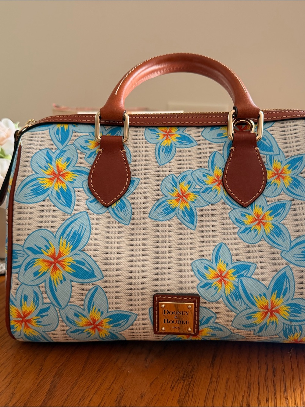 Dooney & Bourke Plumeria Stachelwith Blue and Yellow Floral Print and Brown Trim